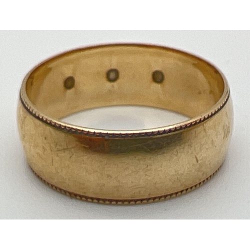 65 - A 9ct yellow gold gypsy style band ring set with 3 small diamonds in an engraved star shaped mount. ... 