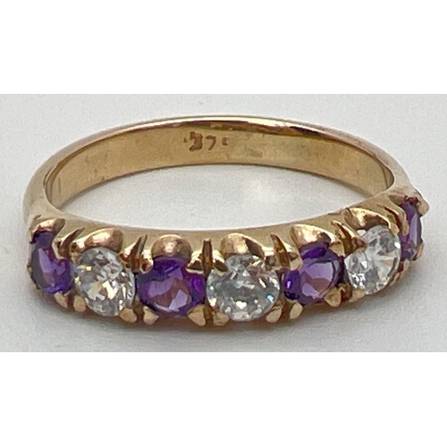 69 - A 9ct yellow gold half eternity ring set with alternating amethyst and clear stones. Stone size appr... 