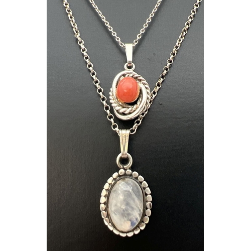 73 - 2 natural stone set silver pendants on silver chains. An oval Moonstone cabochon (approx. 2.5cm drop... 