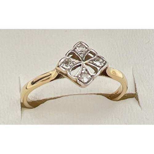 75 - An Art Deco design 18ct gold and diamond ring with a square shaped pierced work mount. Set with 4 sm... 