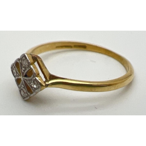 75 - An Art Deco design 18ct gold and diamond ring with a square shaped pierced work mount. Set with 4 sm... 