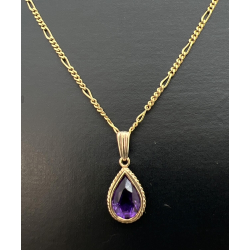 77 - A teardrop shaped amethyst pendant on a 9ct gold 19