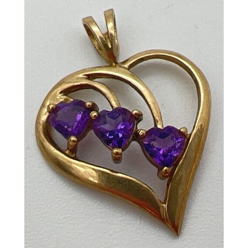 84 - A 9ct gold open heart shaped pendant set with 3 heart cut amethyst stones. Fully hallmarked to bale.... 