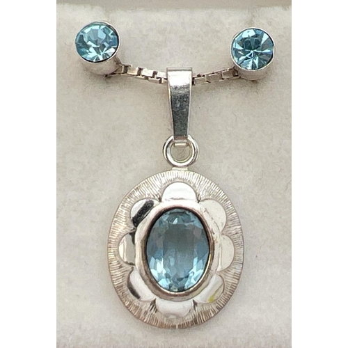 91 - A 925 silver and blue onyx oval shaped pendant on a 16