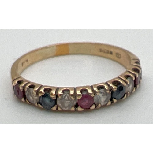 105 - A 9ct gold, ruby, sapphire and clear stone eternity ring, fully hallmarked inside band. Made up of 1... 