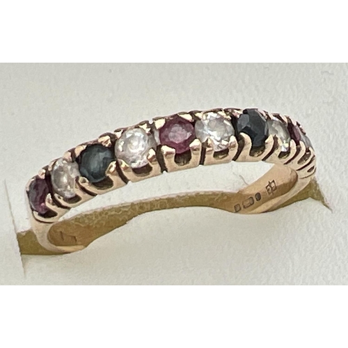 105 - A 9ct gold, ruby, sapphire and clear stone eternity ring, fully hallmarked inside band. Made up of 1... 