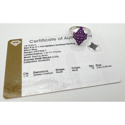 110 - A sterling silver Genuine Gem Company Zambian amethyst ring in a diamond shaped setting. Complete wi... 