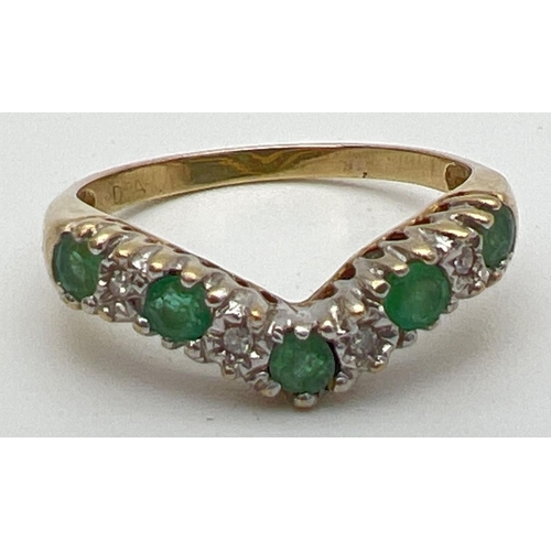 116 - A 9ct gold emerald and diamond wishbone ring set with alternating emeralds and illusion set diamonds... 