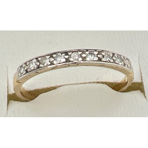 121 - A vintage 18ct gold and diamond eternity ring, stamped 18ct inside band. Ring size L½, total weight ... 