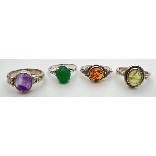 123 - 4 silver and natural single stone set dress rings, to include amber, peridot and amethyst. All stamp... 