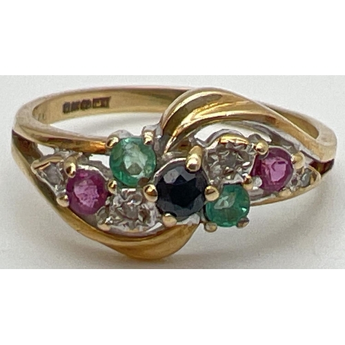 127 - A 9ct gold ring with a twisted design mount, set with rubies, sapphires, emeralds & diamonds. Fully ... 