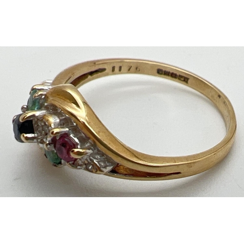 127 - A 9ct gold ring with a twisted design mount, set with rubies, sapphires, emeralds & diamonds. Fully ... 