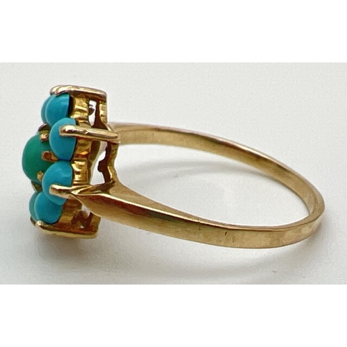 134 - A 9ct gold and turquoise dress ring with 9 cabochons in a flower shaped setting. Fully hallmarked in... 