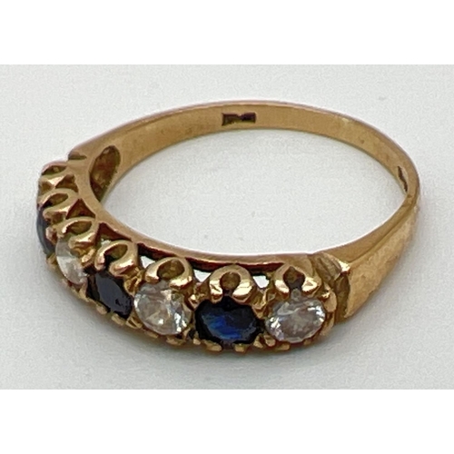 138 - A vintage 9ct gold sapphire and cubic zirconia eternity ring, size M½. Fully hallmarked inside band.... 