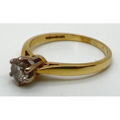 142 - An 18ct gold .5ct diamond solitaire ring in a cathedral setting. Fully hallmarked inside band and al... 