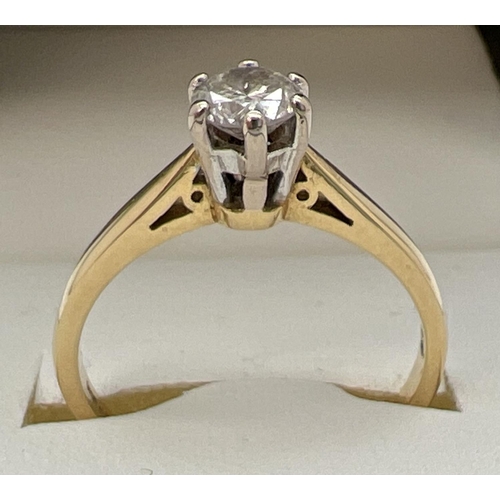 142 - An 18ct gold .5ct diamond solitaire ring in a cathedral setting. Fully hallmarked inside band and al... 