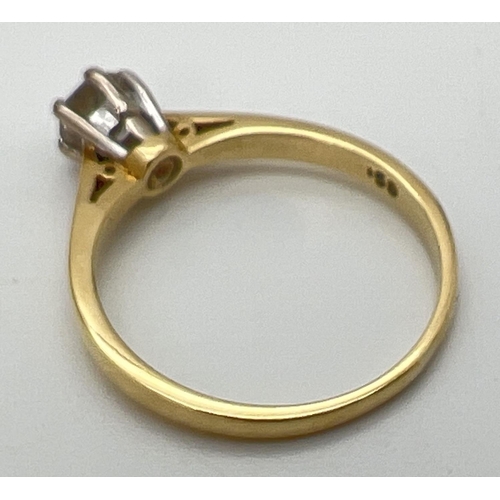 142 - An 18ct gold .5ct diamond solitaire ring in a cathedral setting. Fully hallmarked inside band and al... 