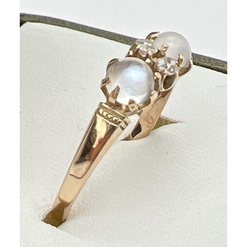 149 - A vintage unmarked yellow metal cats eye style ring set with moonstone & white topaz. Band unmarked ... 