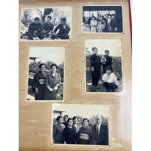 229 - 4 vintage Japanese photograph albums containing various pictures of people, transport, buildings and... 