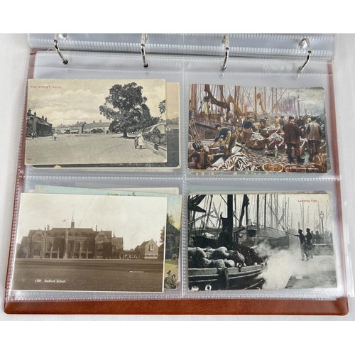 122 - An album containing 160 assorted Edwardian and vintage Norfolk postcards. To include: Great Yarmouth... 