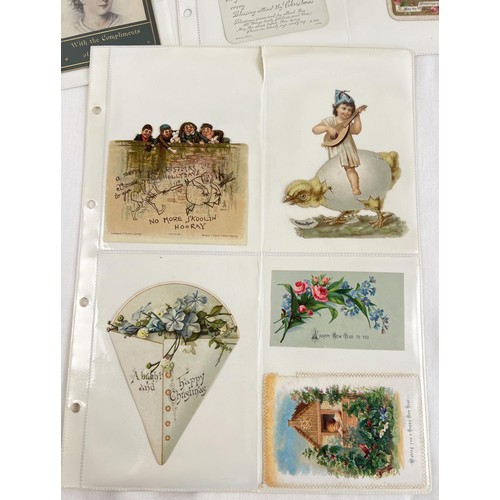 124 - An album containing 150+ late Victorian/Edwardian greetings cards and scraps.