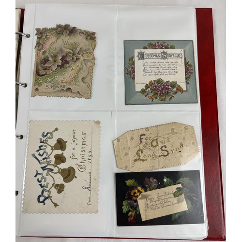 124 - An album containing 150+ late Victorian/Edwardian greetings cards and scraps.