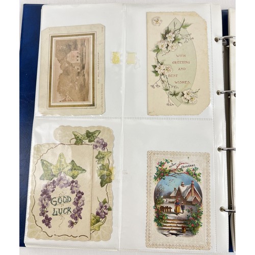 125 - An album of 150+ Late Victorian/Edwardian greetings cards. To include glittered, ribbon and envelope... 