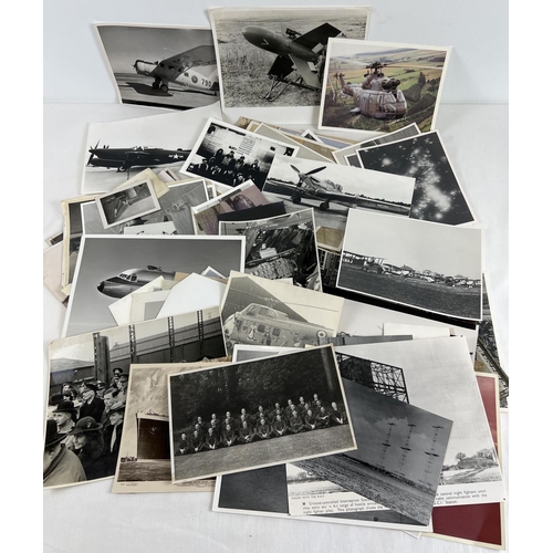 227 - A quantity of assorted vintage black & white photographs, mostly of aeroplanes and ships. In varying... 