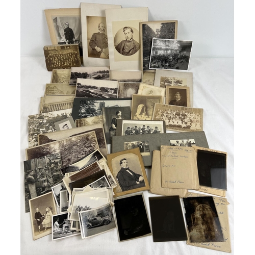 231 - A small 1920's photo album together with a collection of assorted vintage photo's, cabinet cards and... 