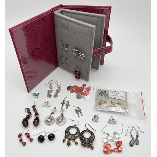 1010 - A collection of 20 pairs of drop and stud style pierced and clip on earrings. To include costume jew... 