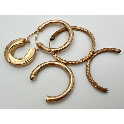 1015 - A small quantity of scrap gold hoop style earring. All marked or test as 9ct gold. Total weight appr... 