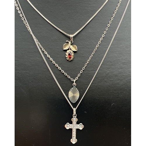 1017 - 3 vintage silver pendant necklaces. A small cross with engraved detail to front on an 18