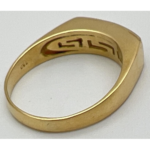 1004 - A modern 18ct gold ring with Greek key design mount set with 24 small diamonds. Stamped 750 inside b... 