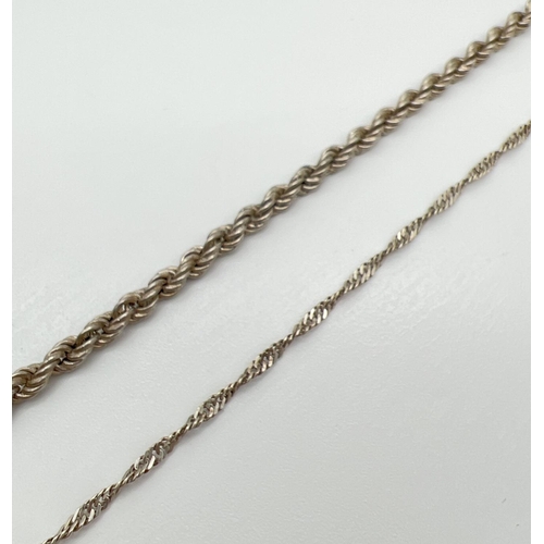 1032 - 2 silver chain bracelets. A 9