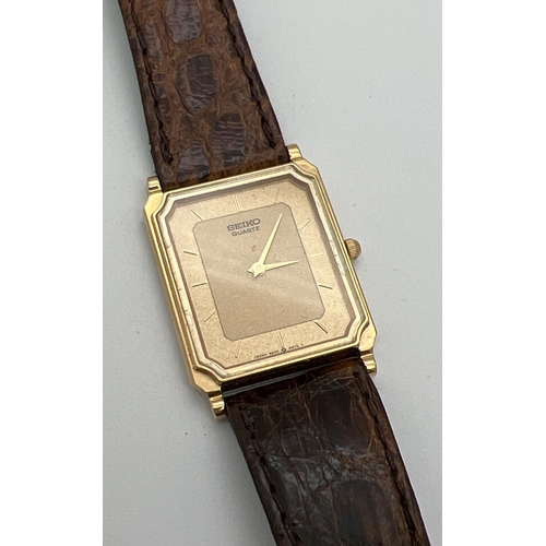 1119 - A vintage square shaped Seiko (9020-5730) gold tone cased watch with original brown leather strap. W... 