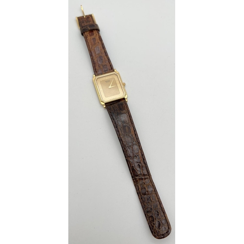 1119 - A vintage square shaped Seiko (9020-5730) gold tone cased watch with original brown leather strap. W... 