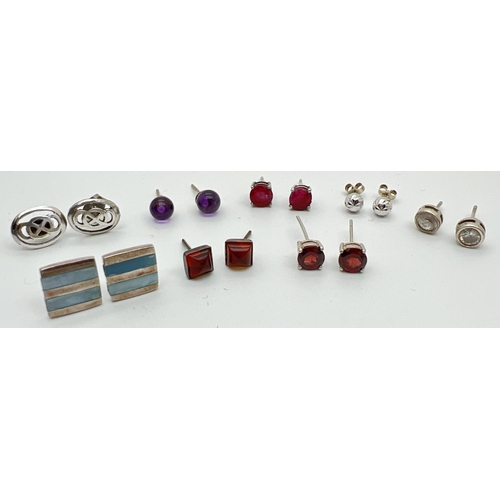 1033 - 8 pairs of silver and stone set stud style earrings for pierced ears. To include garnet, amber, colo... 