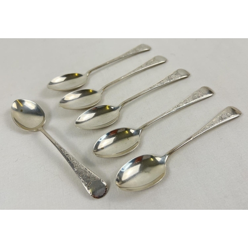 1136 - A set of 6 Edwardian silver teaspoons with decoratively engraved handles of scroll & foliate design.... 