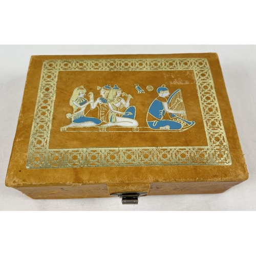 1056 - A vintage leather jewellery box with Egyptian decoration containing a small quantity of jewellery in... 