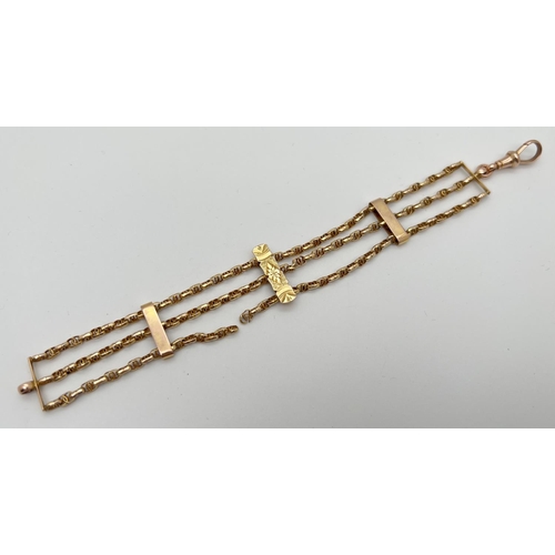 1052 - A vintage yellow gold 3 bar style bracelet with decorative chain links and rose gold lobster claw cl... 