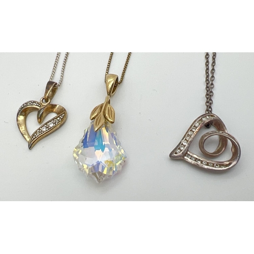 1063 - 3 silver pendant necklaces. 2 x stone set floating heart pendants on silver chains together with a d... 