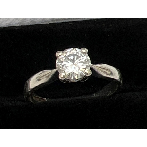 1091 - A 9ct white gold .75ct moissanite solitaire engagement/dress ring. Full hallmarks to inside of band.... 