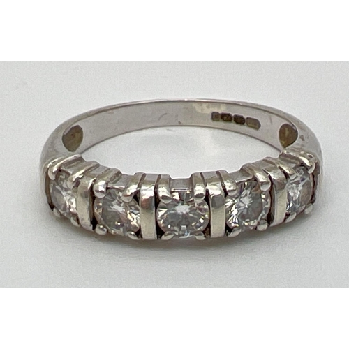 1092 - A 9ct white gold half eternity ring set with 5 .20 ct round cut moissanite stones, total 1ct. Full h... 