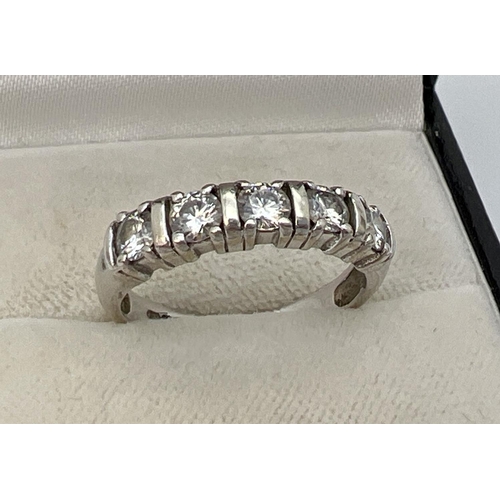 1092 - A 9ct white gold half eternity ring set with 5 .20 ct round cut moissanite stones, total 1ct. Full h... 