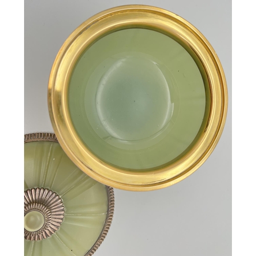 1139 - A late Victorian French green opaline glass lidded bowl with silver mount, circa 1900. Gilt to insid... 