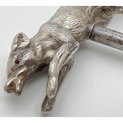 1142 - A vintage novelty corkscrew with silver handle modelled as a running fox, with red stone set eyes. F... 