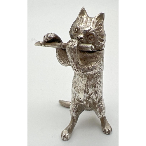 1146 - An Edwardian silver novelty container modelled as a cat playing the flute, with hinged head. Import ... 