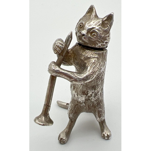 1147 - An Edwardian silver novelty container modelled as a cat playing the clarinet, with hinged head. Impo... 