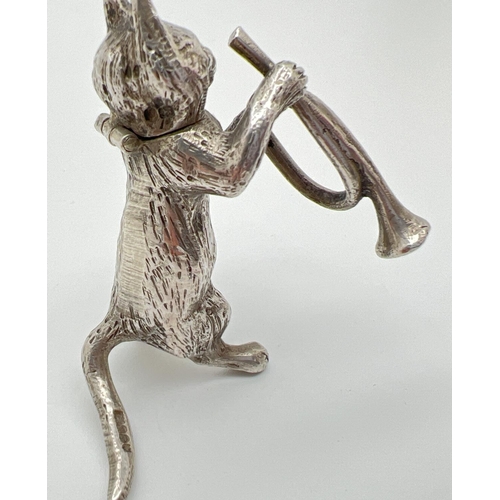 1148 - An Edwardian silver novelty container modelled as a cat playing the bugle, with hinged head. Import ... 