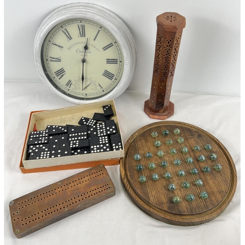 1155 - A collection of mixed items to include a copper topped vintage cribbage board, solitaire marble game... 